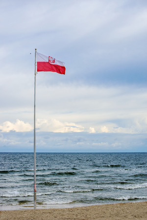 Flag of Poland at the Baltic Seaの写真素材