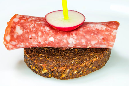 Pumpernickel with salamiの写真素材