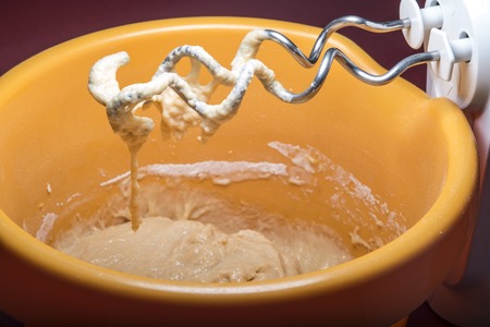 Kneading a dough with a machineの写真素材