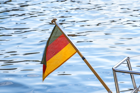 Flag of Germany at a sailing boatの写真素材