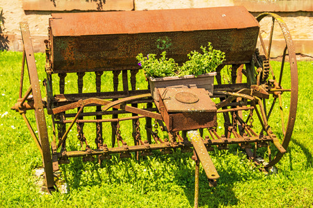 old agricultural machineの写真素材