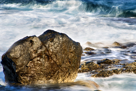 surf of the atlantic ocean in long time exposureの写真素材