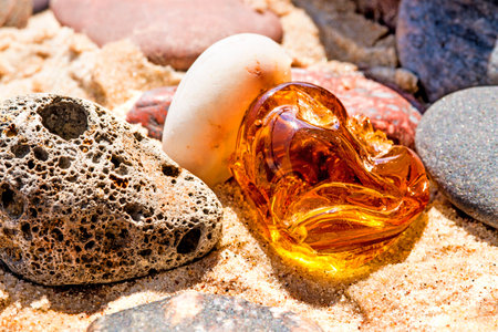 Amber on a beach of the Baltic Seaの写真素材