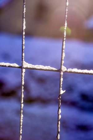 winter scene, fence with snow capの写真素材