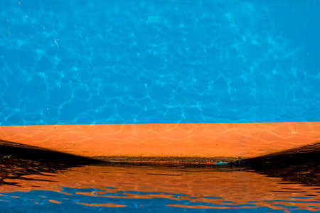 blue ship hull in a port
