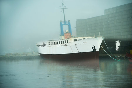 Fishing port of Ustka, Poland with morning fog