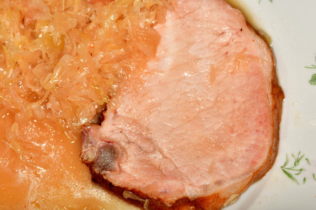 cured cooked pork from the cutlet string and sauerkrautの写真素材