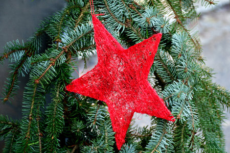 Christmas star on a Christmas tree at a German Christmas marketの写真素材