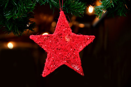 Christmas star on a Christmas tree at a German Christmas marketの写真素材