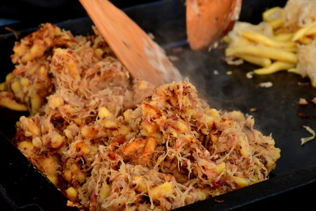 Potato dumblings with sauerkraut at a German Christmas marketの写真素材