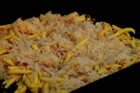 Potato dumblings with sauerkraut at a German Christmas marketの写真素材