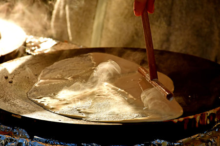 Preparation of crepes at a German Christmas marketの写真素材