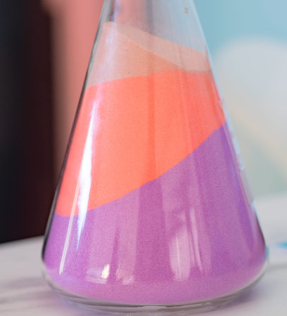 Colorful sand in bottles