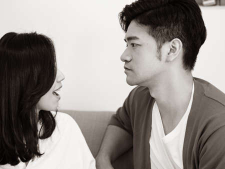 Young woman and man Have Disagreement in black and whiteの写真素材