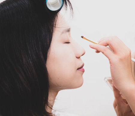 Young girl with makeup cosmeticsの写真素材