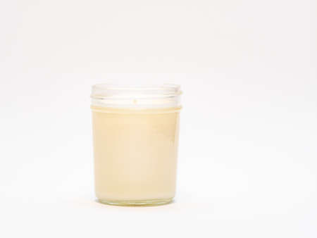 white handmade candle in white backgroundの写真素材