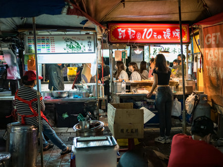 Taipei, Taiwan - December 3,2022: Ningxia Road Night Market facade on December 3,2022 in Taipei,Taiwan.The snack stalls and other shops are known for their friendly service, making this a popular spot.のeditorial素材
