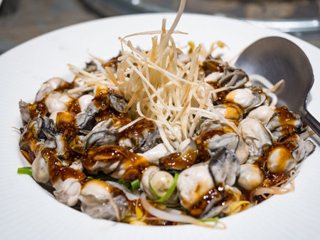 Oyster with Garlic Sauce and shredded gingerの写真素材