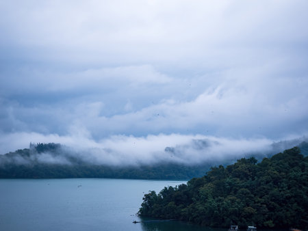 SUN MOON LAKE,TAIWAN - JUNE 10: many boats parking at the pier on June 10, 2023 at Sun Moon Lake, Taiwan. Sun Moon Lake is the largest body of water in Taiwan as well as a tourist attraction.のeditorial素材