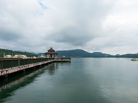 SUN MOON LAKE,TAIWAN - JUNE 10: many boats parking at the pier on June 10, 2023 at Sun Moon Lake, Taiwan. Sun Moon Lake is the largest body of water in Taiwan as well as a tourist attraction.のeditorial素材