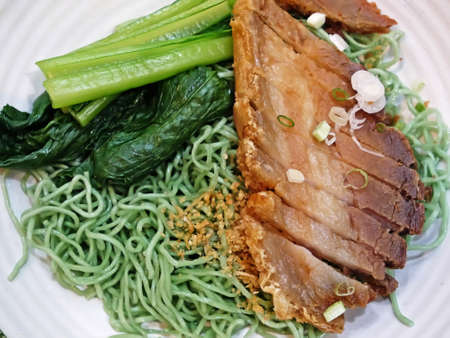 Dry noodle with crispy porkの写真素材