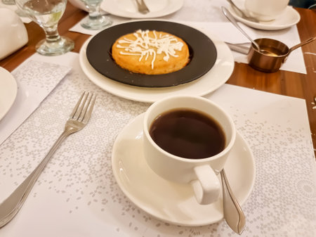 Arabic and Lebanese black tea appetizer with sweet kunafa or kanafa. sideview from aboveの写真素材