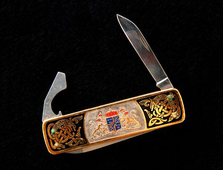golden decorated pocket knifeの写真素材