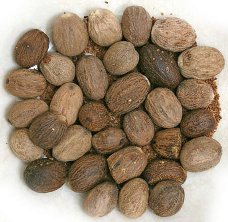 whole nutmeg, maceの写真素材
