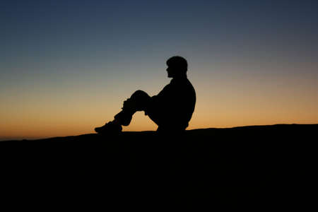 Silhouette at sunsetの写真素材