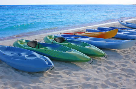 several boats pulled ashore at Riviera Maya, Mexicoの写真素材