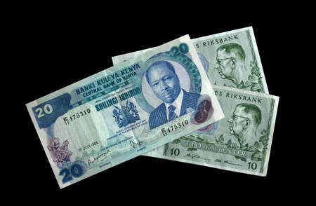 Swedish kronor and Kenyan shilingi paper billsの写真素材