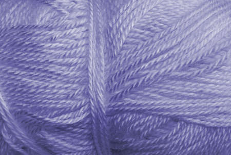 a skein of acrylic blue lightweight yarnの写真素材