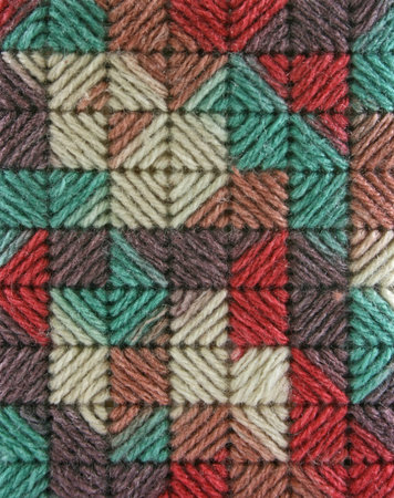 a handmade yarn tissue box cover and tissue on isolated background