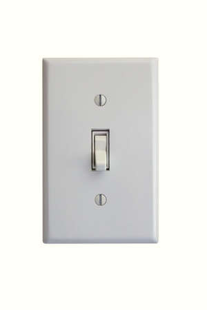 a single-toggle light switch on an isolated backgroundの写真素材