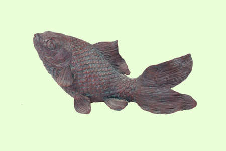 a carving of an elegant fish from Indonesiaの写真素材