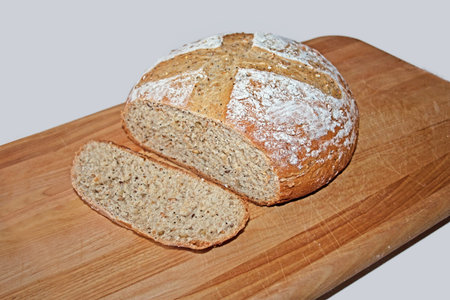 an artisan loaf of multi-seed whole wheat bread