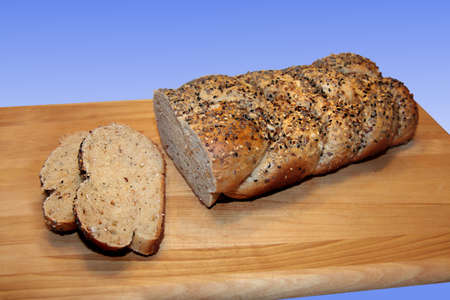 Braided, seeded whole wheat artisan breadの写真素材