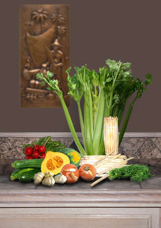 a variety of fresh vegetables and counterの写真素材