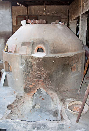 an ancient pottery kiln still in use in Jaipur, Indiaの写真素材