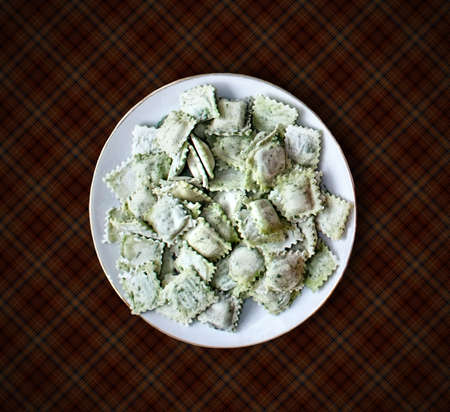 a plate of spinach ravioliの写真素材