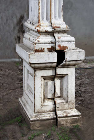 an old broken column on a pedestalの写真素材