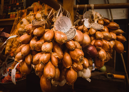 Bunches of shallots displayed in a farm show in the uk. Made and grown in France Produit de France