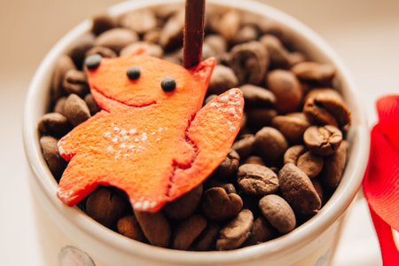 coffee grain on the background of green leaves and other objectsの写真素材