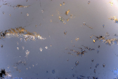 Frosty natural pattern on glass as an abstract background. Textureの写真素材