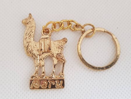 A peruvian golden keychain of a llamaの写真素材