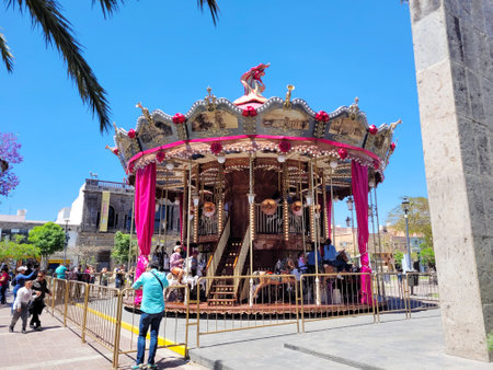 Spinning in the Heart of Guadalajara: Enchanting Colors of the Carouselのeditorial素材