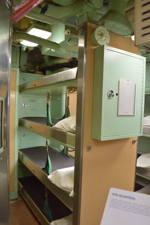 New York, USA - May 17 2023: A row of bunk beds in the intrepid air and space museum in New Yorkのeditorial素材