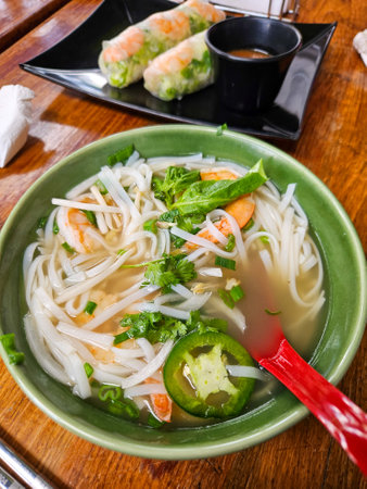 Plate of hot Pho in a Vietnamese food restaurant, mealの写真素材