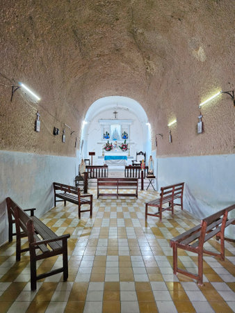 A vertical interior view of the main altar inside the Arena Temple in Villa Corona, Jalisco, showcasing its architectural beauty and religious significanceの写真素材