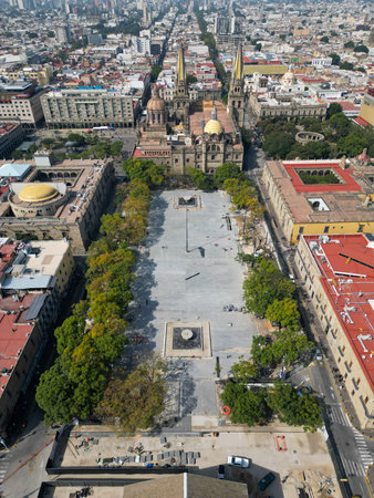 Guadalajara, Mexico - November 8 2025: Drone perspective of Guadalajara Cathedral and Plaza Tapatia undergoing renovation. Historic architecture and urban renewalのeditorial素材